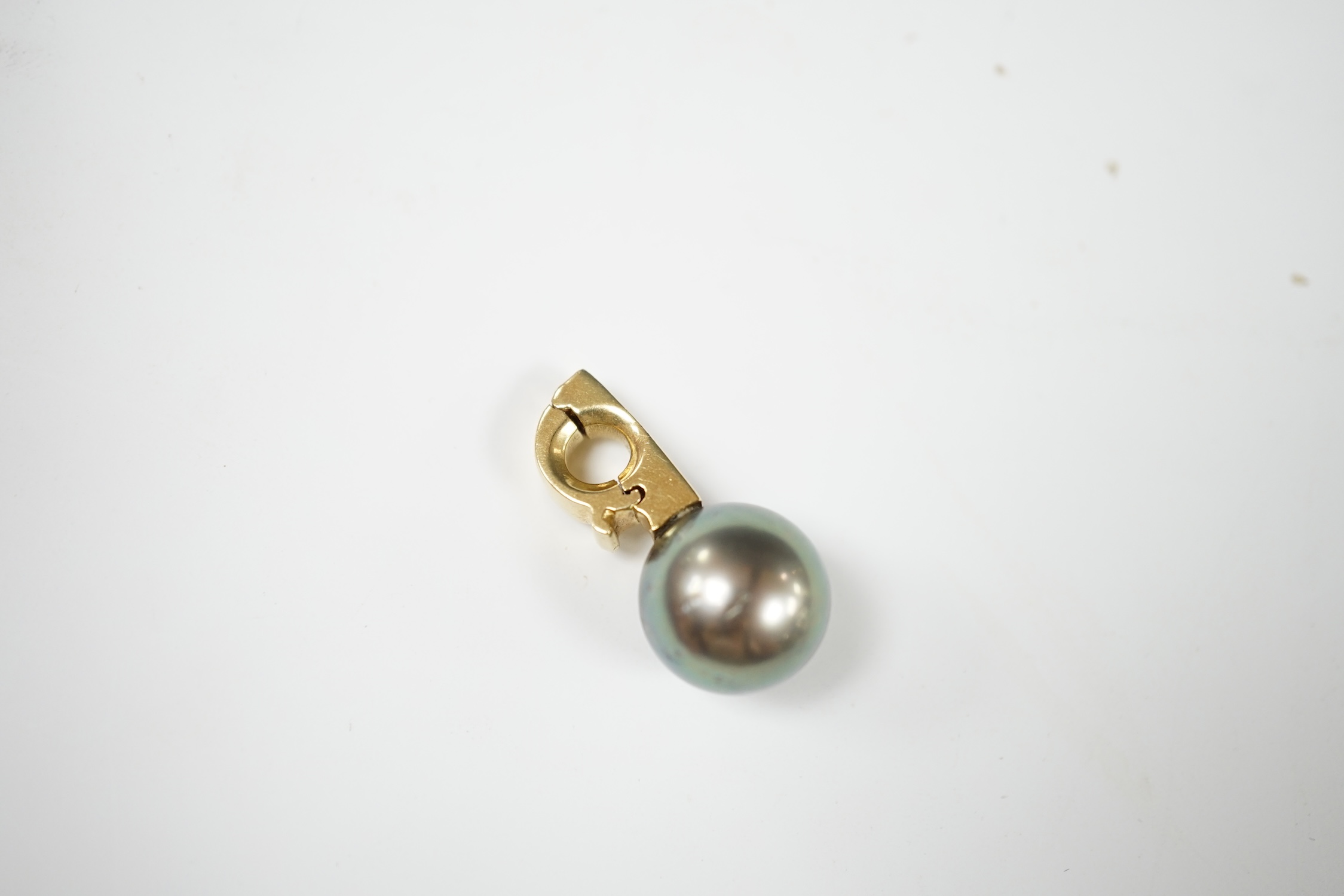 A modern yellow metal, Tahitian pearl and diamond cluster set pendant, 25mm, gross weight 6 grams. Condition - fair to good